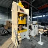 250 ton closed frame hydraulic press left side view, industrial metal stamping and forming machine with robust structure