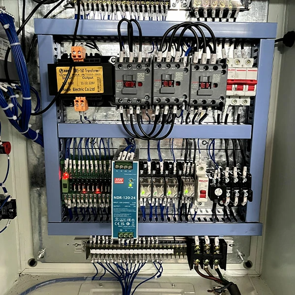 Electrical cabinet interior of 100 ton hydraulic punching press machine, stable power control system for industrial automation