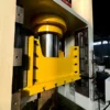 Hydraulic press slider detail with multi-rod ejecting system, designed for precision metal forming and deep drawing applications
